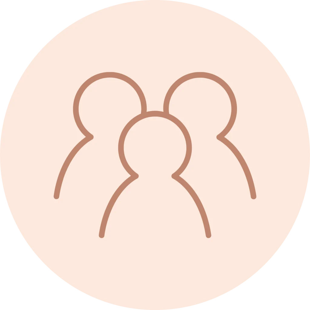 Minimalist line icon of three people silhouettes grouped together inside a circle, in a muted rose outline on a pale peach background.