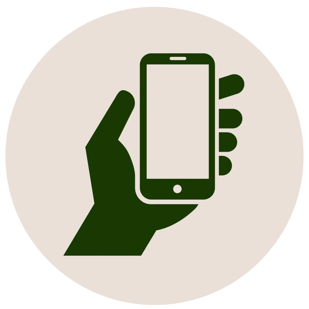 Minimalist flat icon of a hand holding a smartphone inside a circle, in a dark green silhouette on an off-white background.