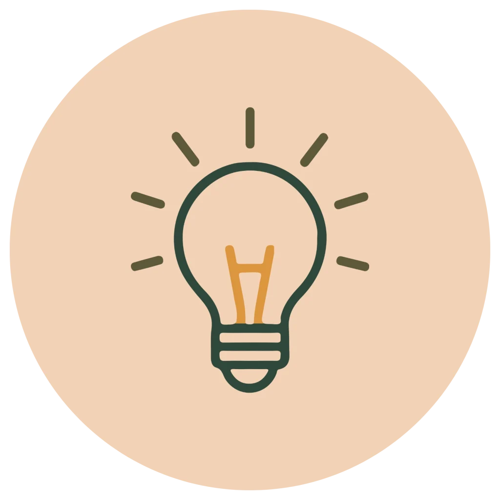 Minimalist line icon of a glowing lightbulb in dark green and orange outline, inside a peach circle background.