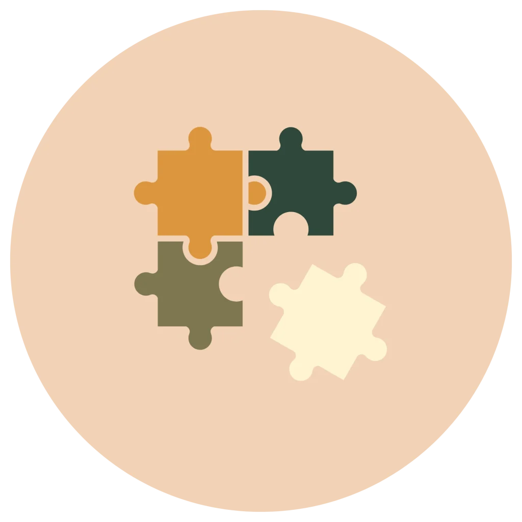Minimalist flat icon of four puzzle pieces in orange, dark green, olive, and off-white, inside a peach circle background.