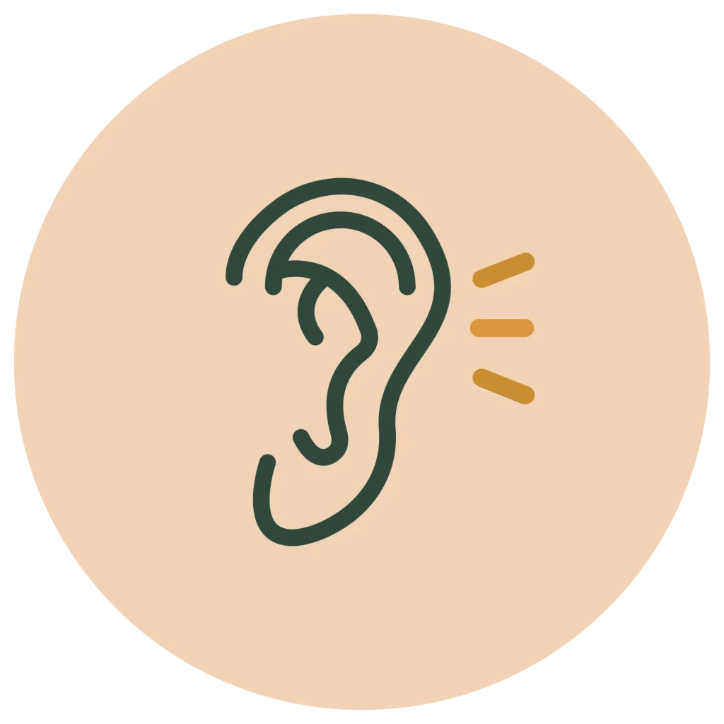 Minimalist line icon of a dark green ear with orange sound waves, inside a peach circle background.