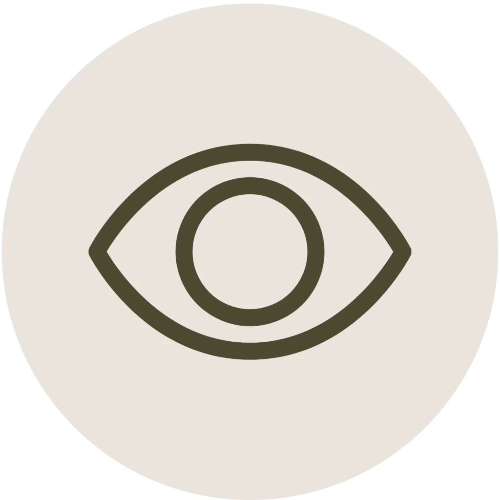 Minimalist line icon of a human eye inside a circle, in a dark green outline on an off-white background.