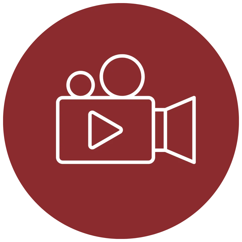 White line icon of a video camera with a play symbol inside, set within a red circle background.