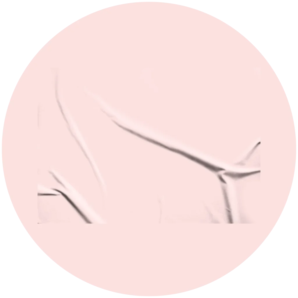 Wrinkled plastic texture with creases centered on a light pink circular background.
