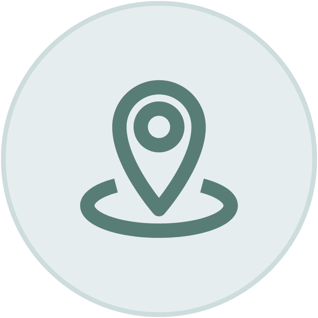 Green map location pin icon inside a light blue-green circle.