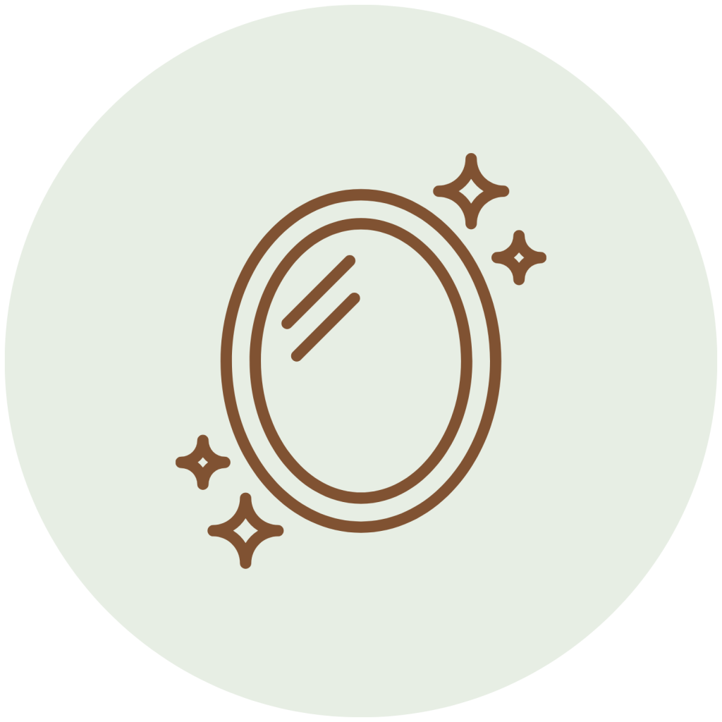 A mirror with four stars icon, centered in a light green circle.