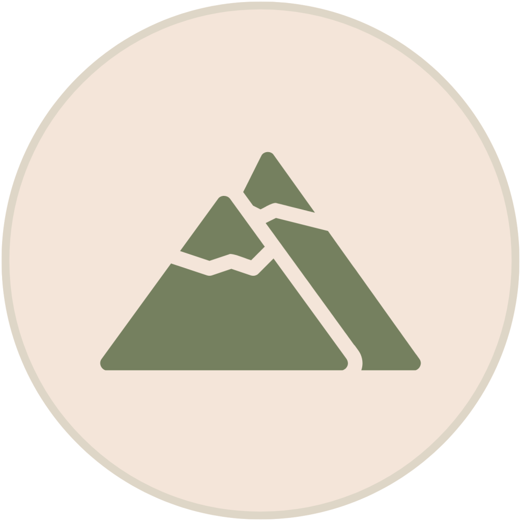 Green mountain peaks icon inside a light beige circle.